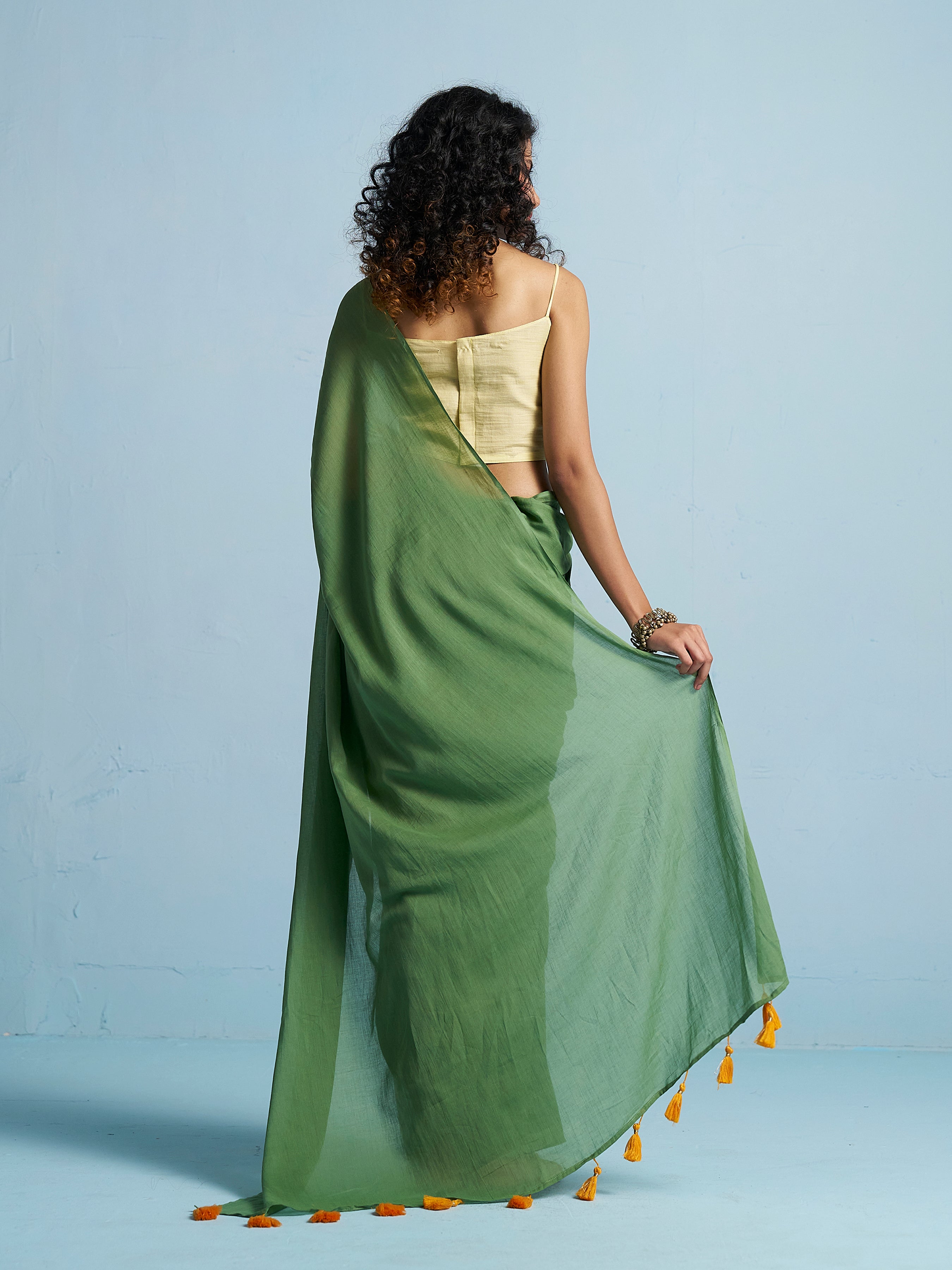 OLIVE GREEN VISCOSE MUL LIVA SOLID SAREE