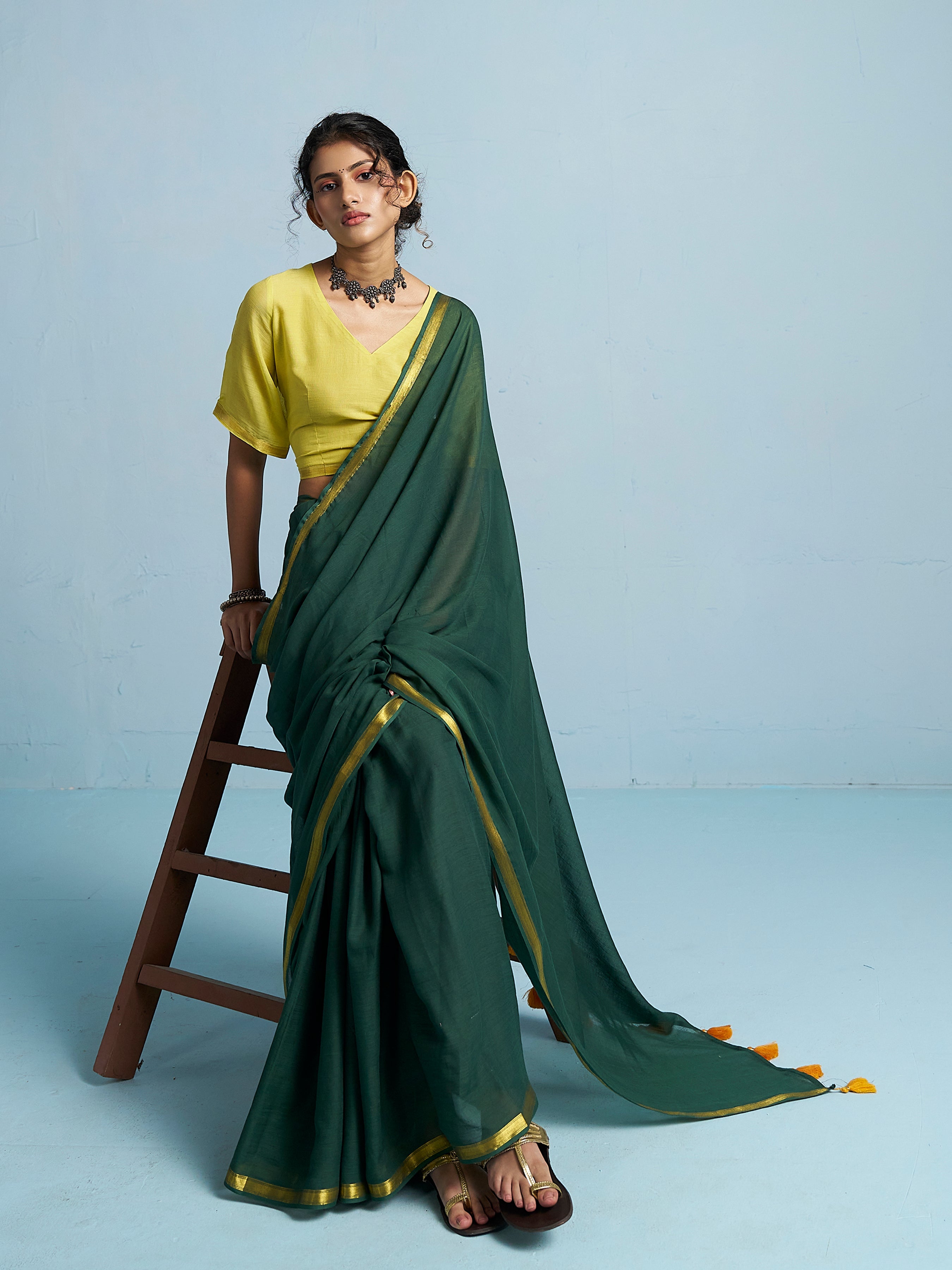 BOTTLE GREEN VISCOSE MUL LIVA SOLID SAREE