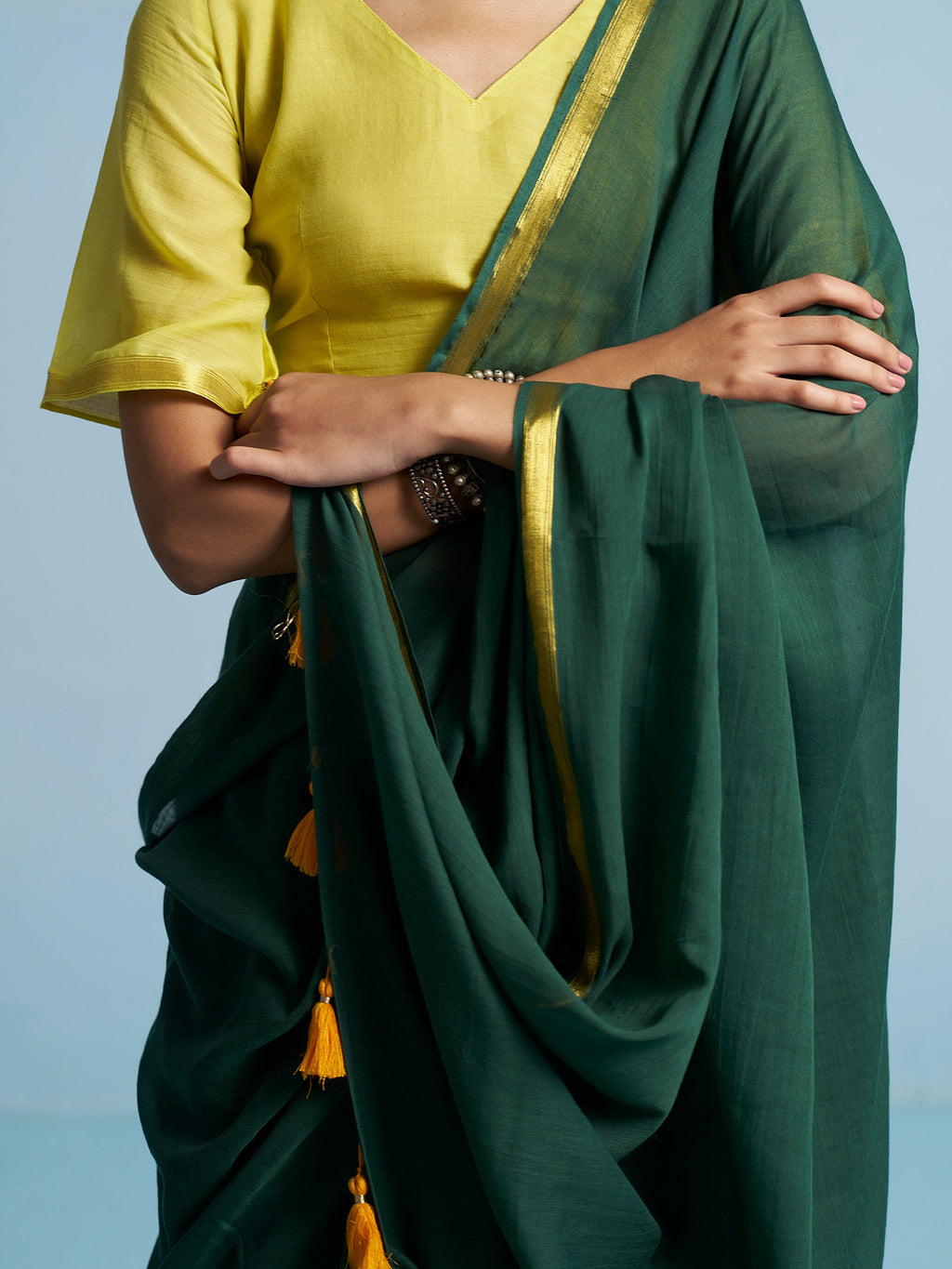 BOTTLE GREEN VISCOSE MUL LIVA SOLID SAREE