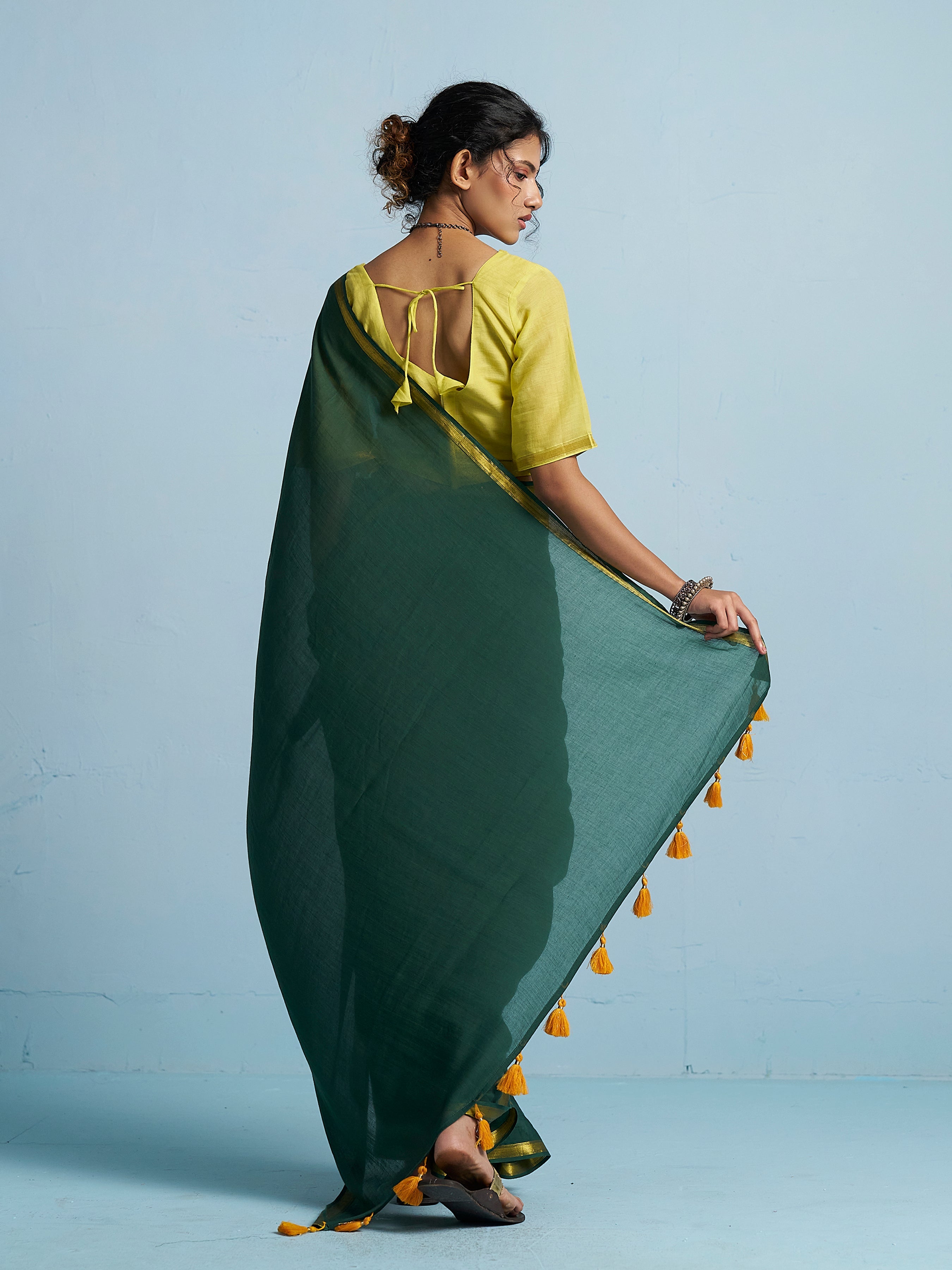 BOTTLE GREEN VISCOSE MUL LIVA SOLID SAREE