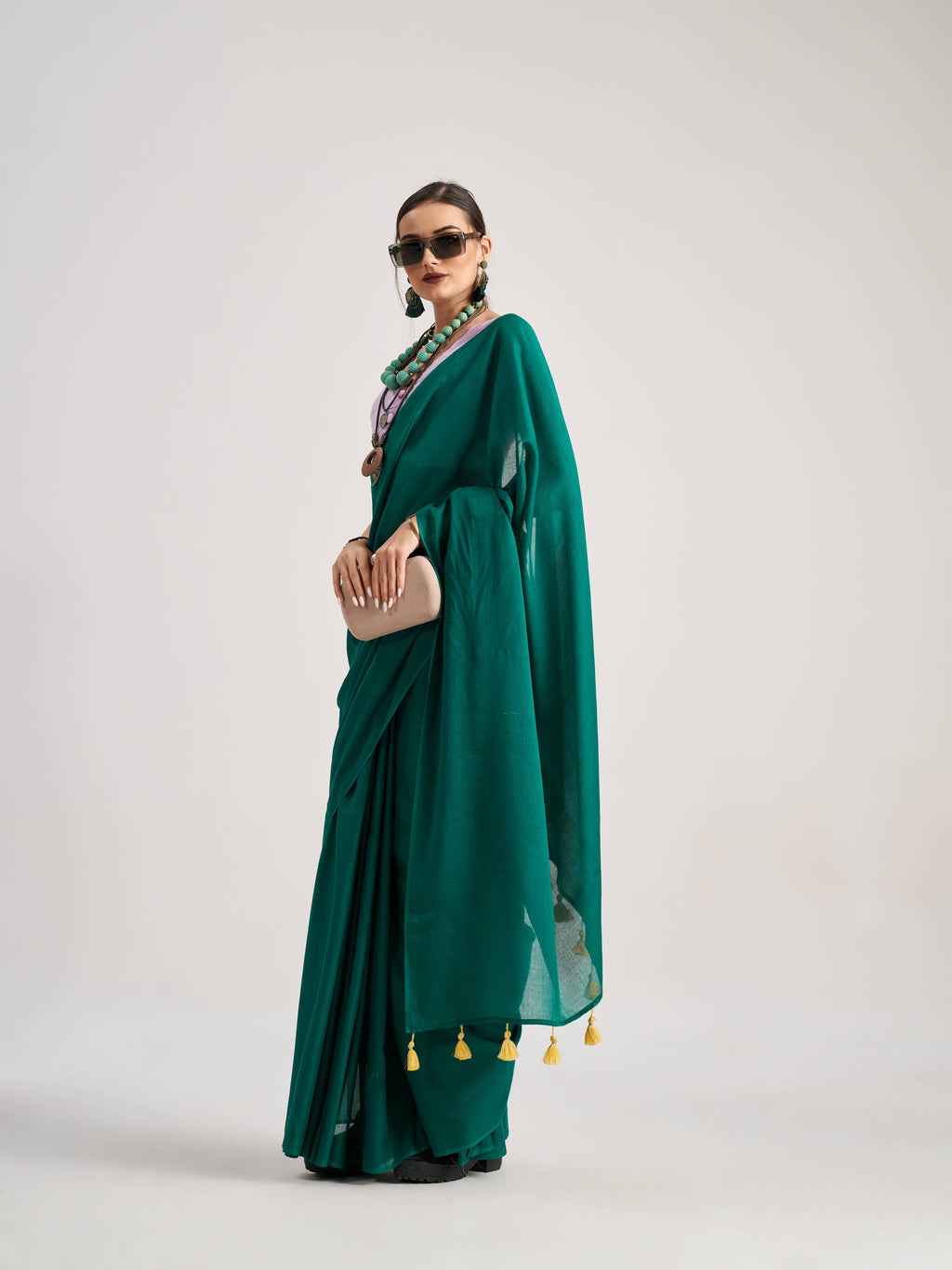 BOTTLE GREEN VISCOSE MUL SOLID SAREE