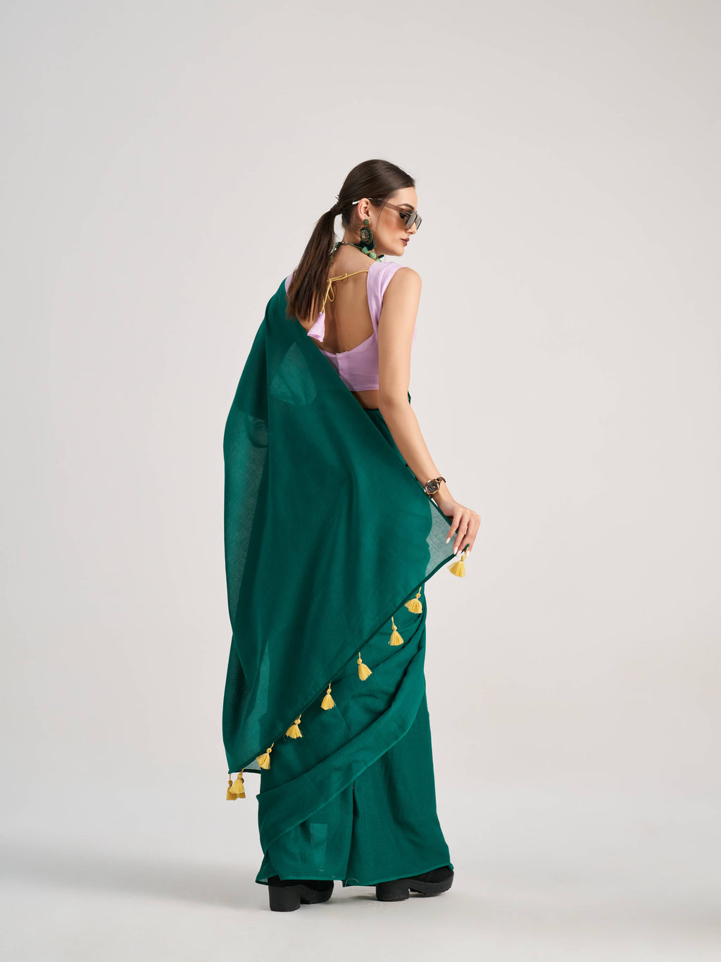 BOTTLE GREEN VISCOSE MUL SOLID SAREE